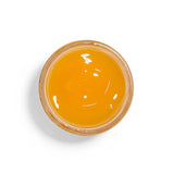 Farmhouse Fresh Honey Heel Glaze open jar from above showing the golden glaze