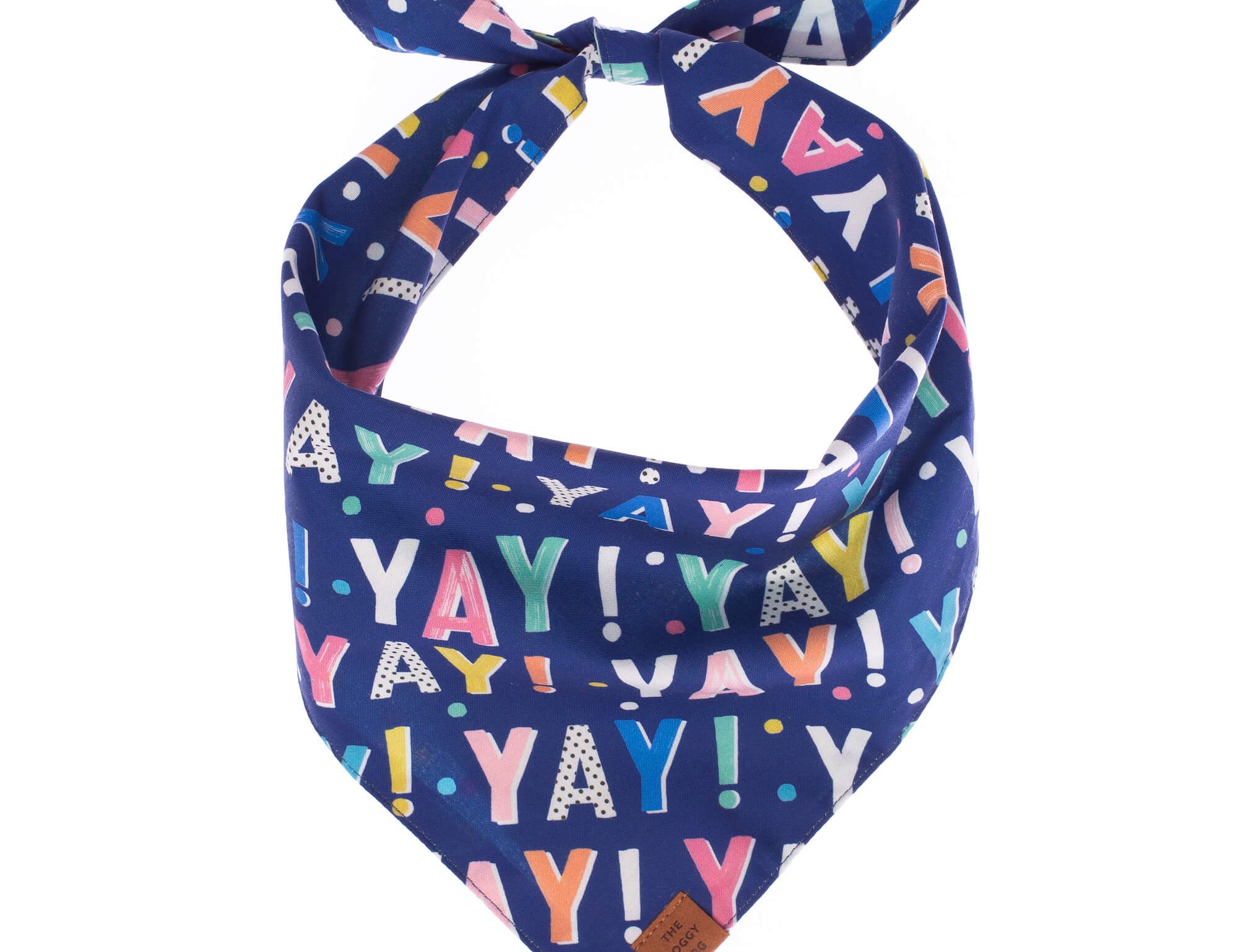 Foggy Dog Dog Bandana in Birthday, a navy tie-on bandana printed with colorful YAY lettering