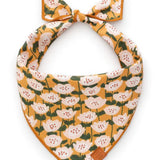 Foggy Dog Dog Bandana in Golden Flowers, a mustard yellow tie-on bandana with white floral print
