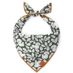 Foggy Dog Dog Bandana in Squirrel, a dark green tie-on bandana with a white squirrel and leaf print