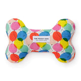 Foggy Dog Dog Squeaky Toy in Balloons, a plush bone with a colorful balloon print