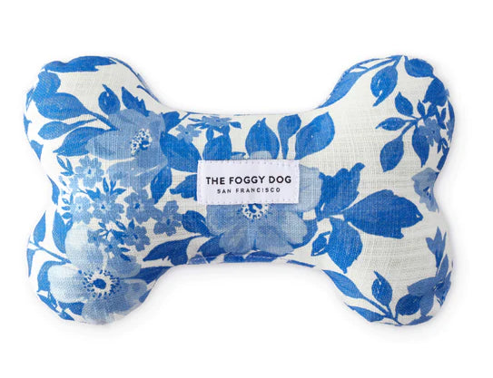 Foggy Dog Dog Squeaky Toy in Blue Roses, a plush bone with a blue and white floral print