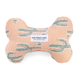 Foggy Dog Dog Squeaky Toy in Cactus Garden, a peach plush bone with a sage cactus print