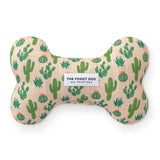 Foggy Dog Dog Squeaky Toy in Desert Cactus, a blush plush bone with a green cactus print