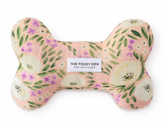 Foggy Dog Dog Squeaky Toy in Harper Floral, a plush bone with pink and green floral print