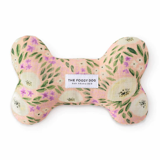 Foggy Dog Dog Squeaky Toy in Harper Floral, a plush bone with pink and green floral print