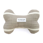 Foggy Dog Dog Squeaky Toy in Modern Stripe Warm Stone, a taupe plush bone with a thin cream stripe