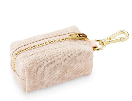 Foggy Dog Poop Bag Holder in Sand Waxed, a tan waxed canvas pouch with a gold zipper and clip