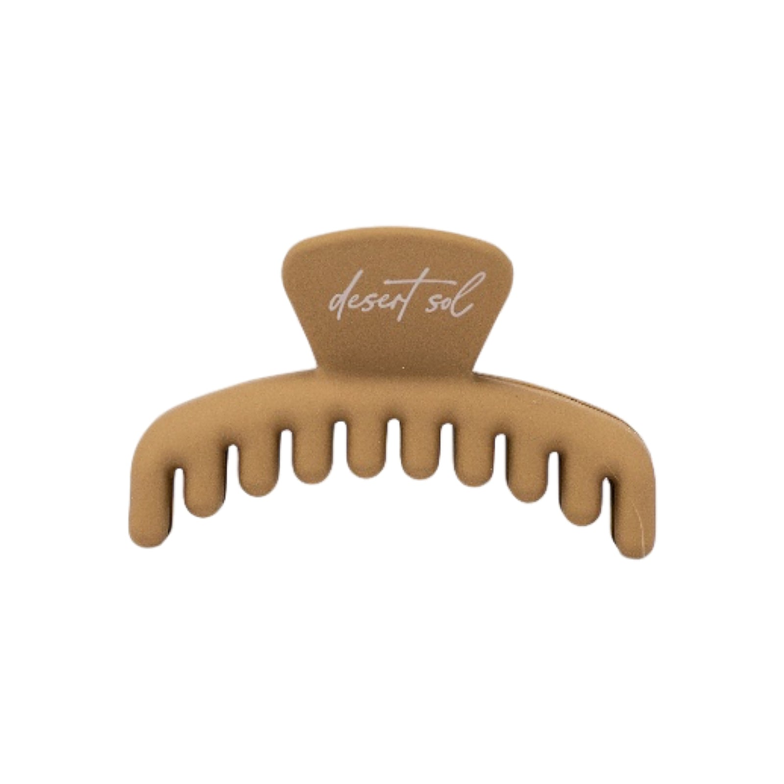 Frenchie claw clip in Caramel, petite size, a matte tan hair claw clip with desert sol script on the top tab, on a white background.