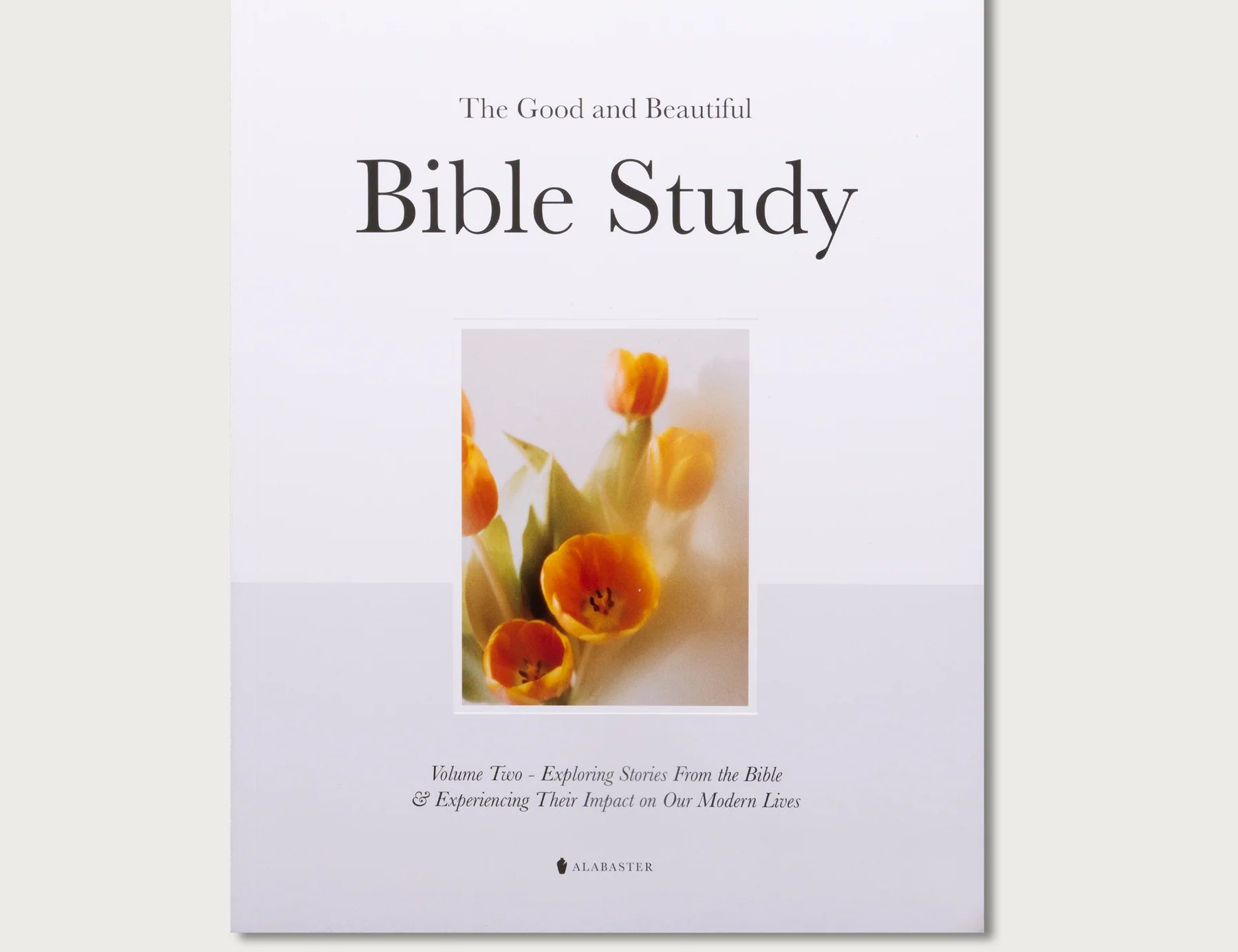 The Good and Beautiful Bible Study Volume 2, a white cover with a photo of yellow tulips