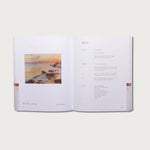 The Good and Beautiful Bible Study Volume 2 open to a Reflect page with a coastal photo