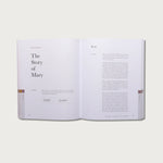The Good and Beautiful Bible Study Volume 2 open to The Story of Mary