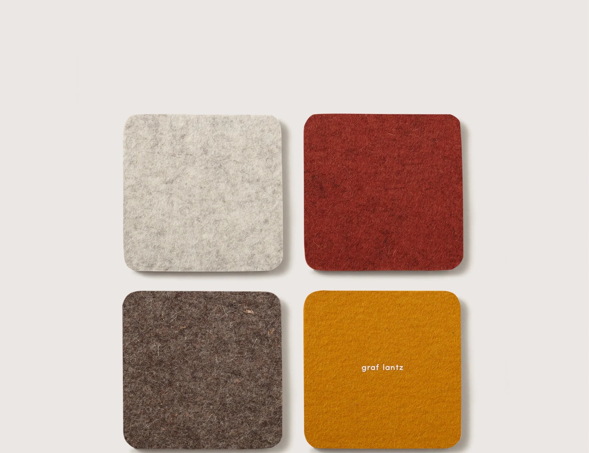 Graf Lantz Bierfilzl Merino Wool Square Coasters in Desert Sun, four felt coasters in cream, rust, brown and mustard