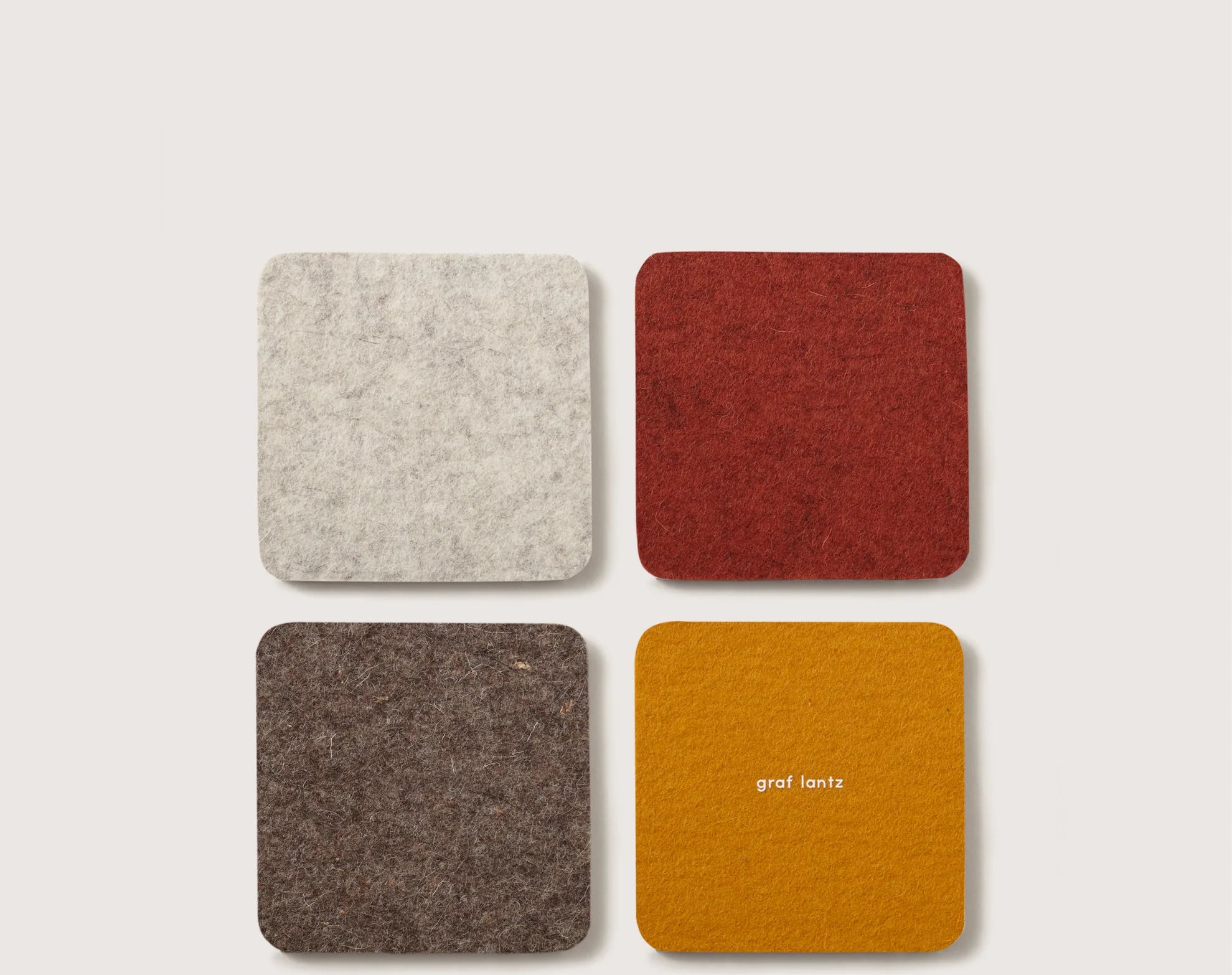 Graf Lantz Bierfilzl Merino Wool Square Coasters in Desert Sun, four felt coasters in cream, rust, brown and mustard
