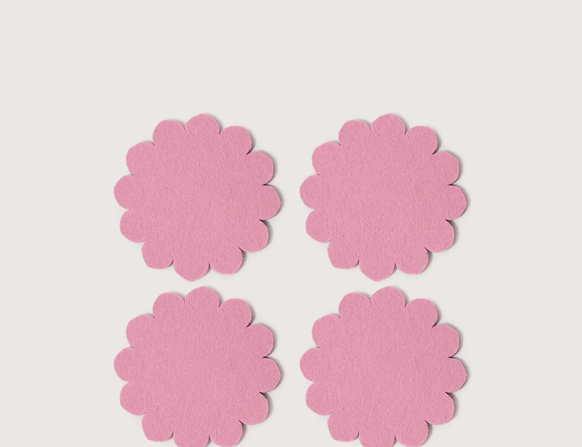 Graf Lantz Coaster Crest 4 Pack in Mauve, four scalloped pink merino felt coasters