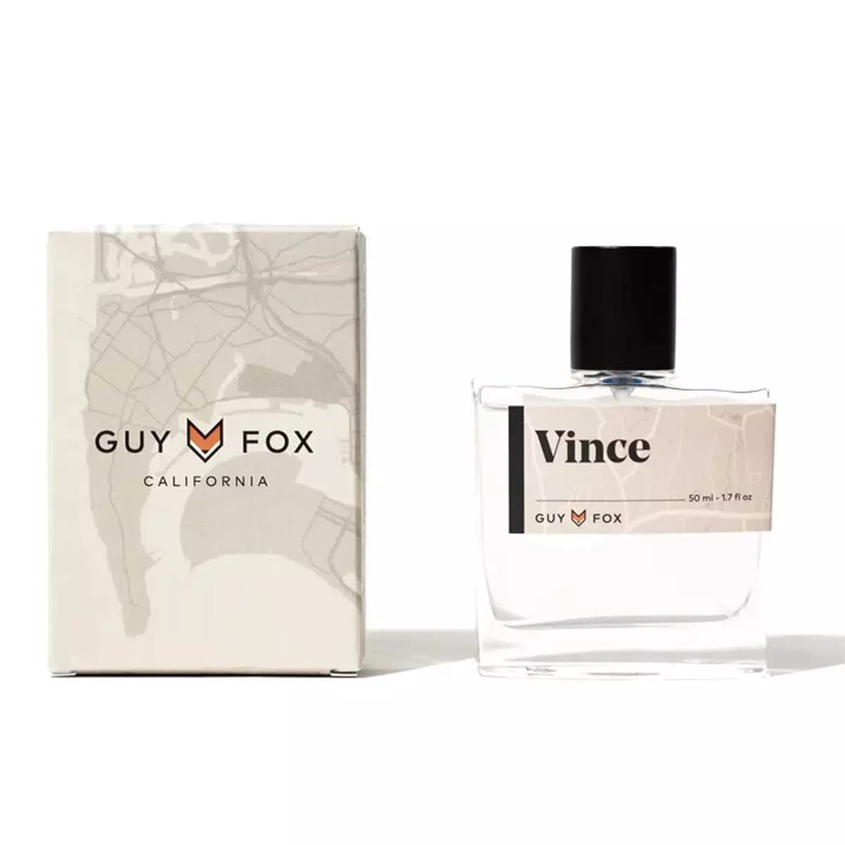 Guy Fox Vince Cologne, a clear glass bottle with a black cap beside its cream and black box
