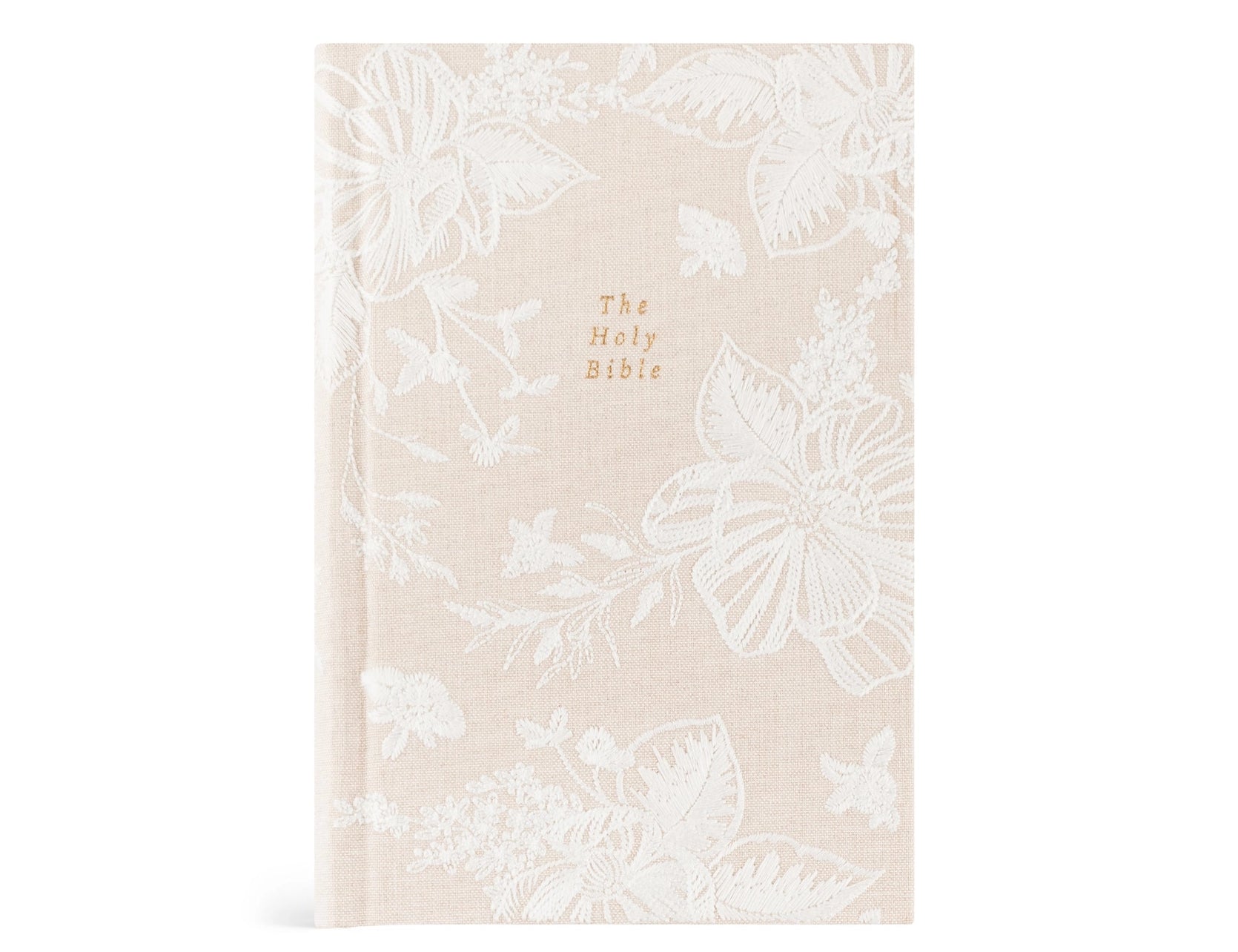 Hosanna Revival NLT Compact Bible in the Casablanca theme, a cream cover with a tonal white floral print