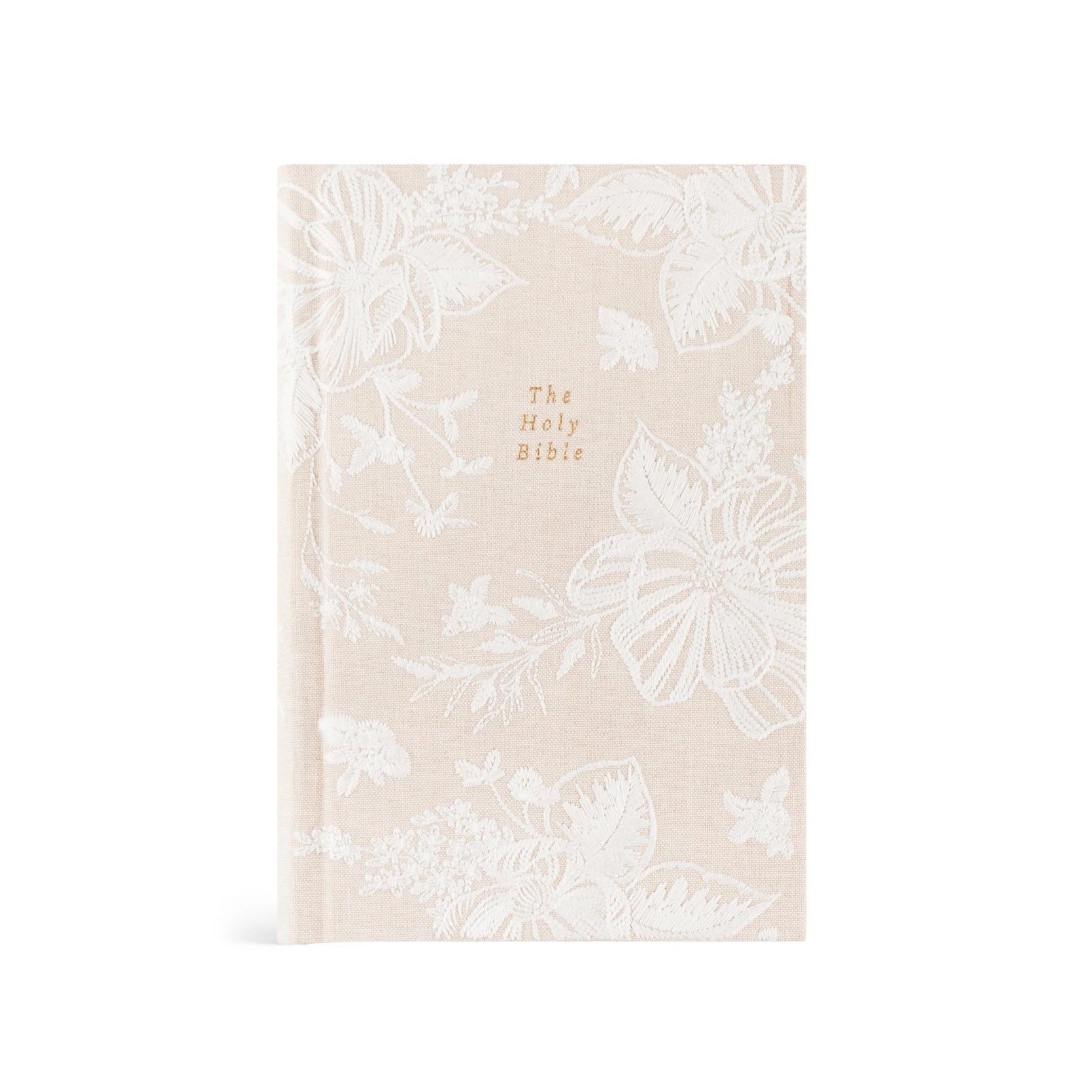 Hosanna Revival NLT Compact Bible in the Casablanca theme, a cream cover with a tonal white floral print