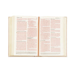 Hosanna Revival NLT Compact Bible Casablanca theme open to a page with red-letter text