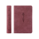 Hosanna Revival NLT Compact Bible in the Helena theme, a burgundy faux leather cover with an embossed flower