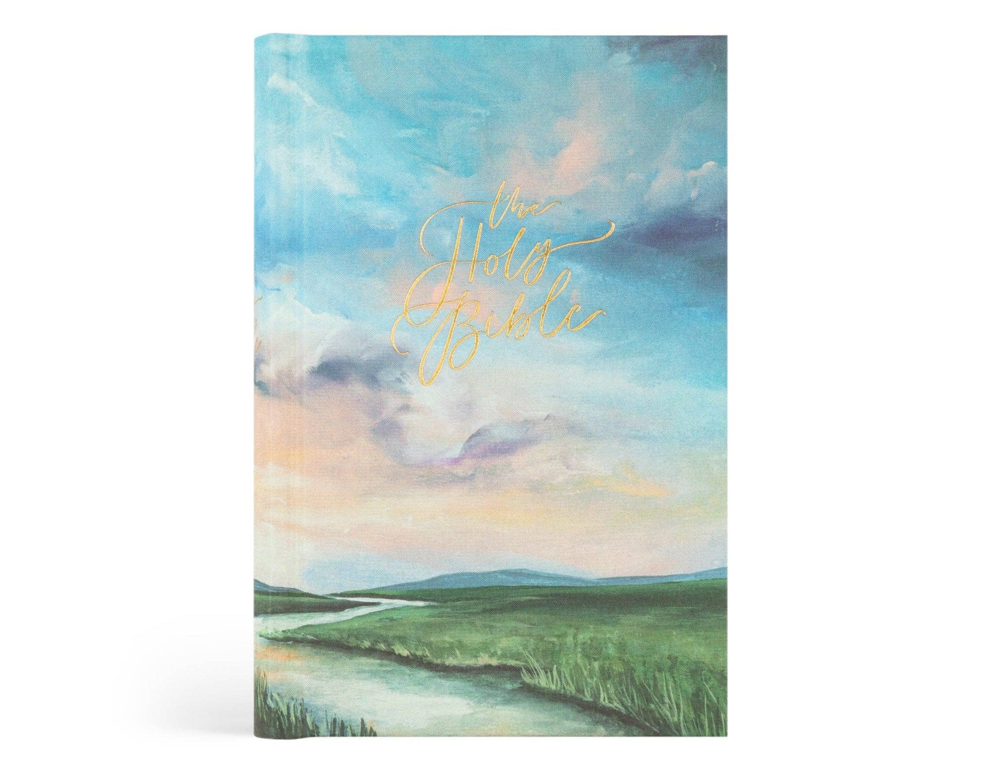 Hosanna Revival NLT Compact Bible in the Prairie theme, a painted sky and green field cover