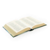 Hosanna Revival NLT Compact Bible Prairie theme lying open at an angle
