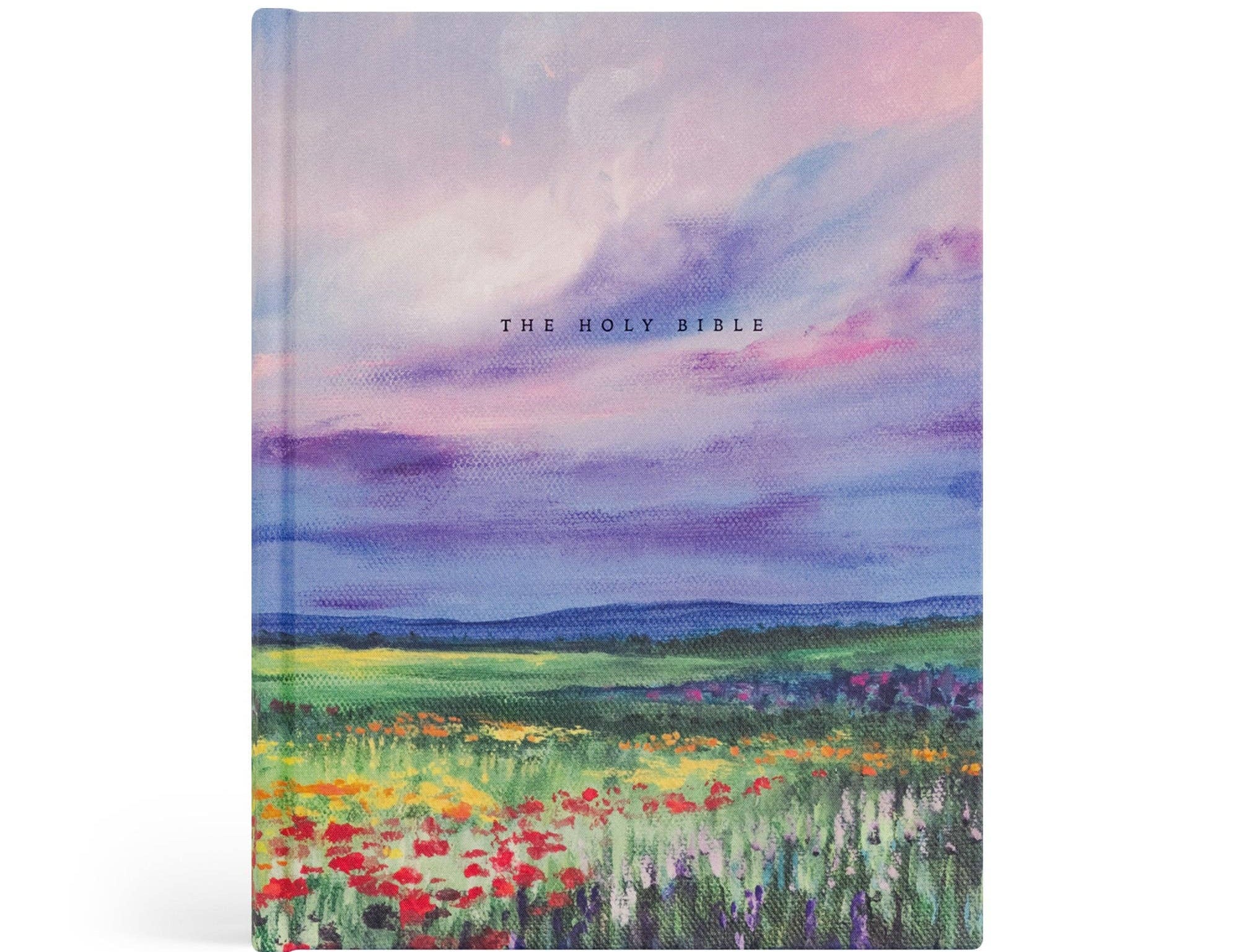 Hosanna Revival NLT Notetaking Bible in the Cana theme, a painted purple sky over a wildflower meadow