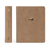 Hosanna Revival NLT Notetaking Bible Galilee theme shown with its tan spine