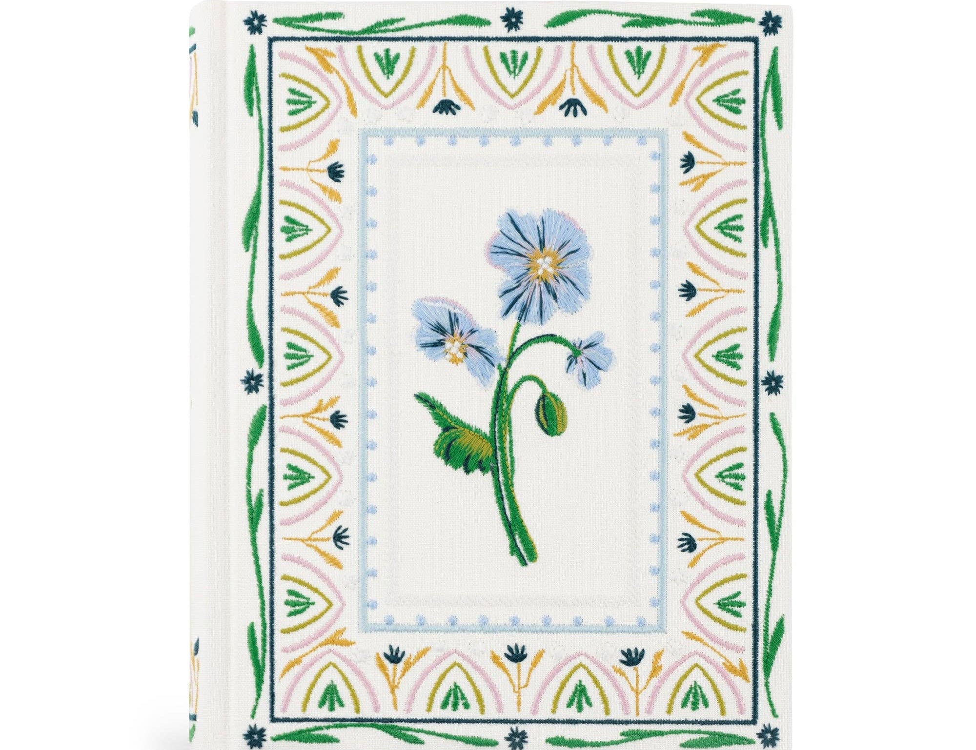 Hosanna Revival NLT Notetaking Bible in the Lisbon theme, a cream cover with a blue flower and painted tile border