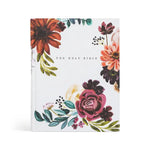Hosanna Revival NLT Notetaking Bible in the Madrid theme, a white cover with burgundy and rust painted florals
