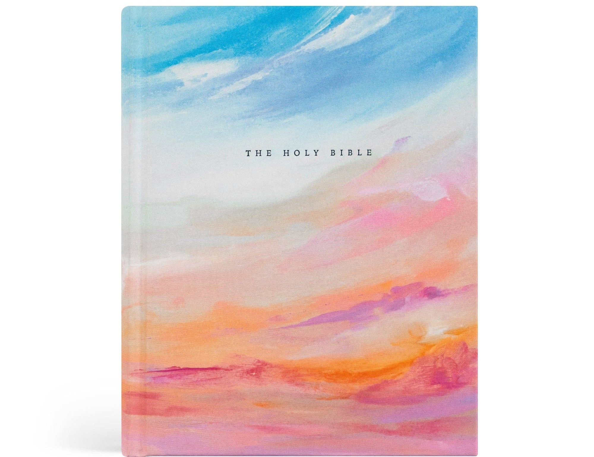 Hosanna Revival NLT Notetaking Bible in the Rosemary Beach theme, a painted blue, orange and pink sunset sky cover