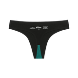 Huha Seamless Low Mid Thong in Black, inside view laid flat showing the teal gusset and printed label