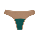 Huha Seamless Low Mid Thong in Tan, front view laid flat with the teal gusset visible