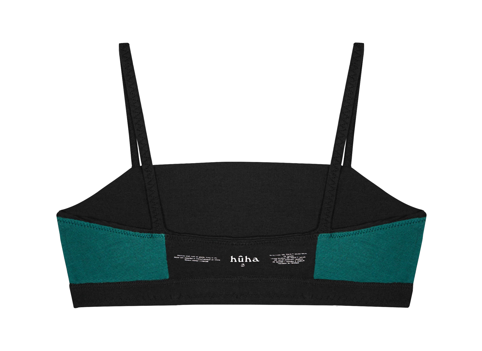 Huha Tata Bralette in Black, inside view laid flat showing the teal lining and printed label