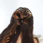 Kaxi Bow Pins in Silver and gold tucked into a half-up brunette hairstyle
