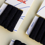 Kaxi The Hold All Day Hair Ties 3 Pack in Black, three thick elastic ties on their card