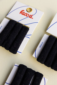Kaxi The Hold All Day Hair Ties 3 Pack in Black, three thick elastic ties on their card