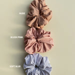 Kaxi Oversized Workout Scrunchies labeled Nude, Blush Pink and Soft Blue