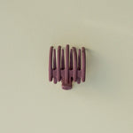 Kaxi Wide Lay Down Claw in mauve, a flat wide-tooth claw clip on a cream background
