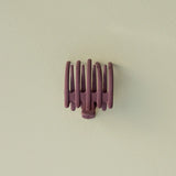 Kaxi Wide Lay Down Claw in mauve, a flat wide-tooth claw clip on a cream background