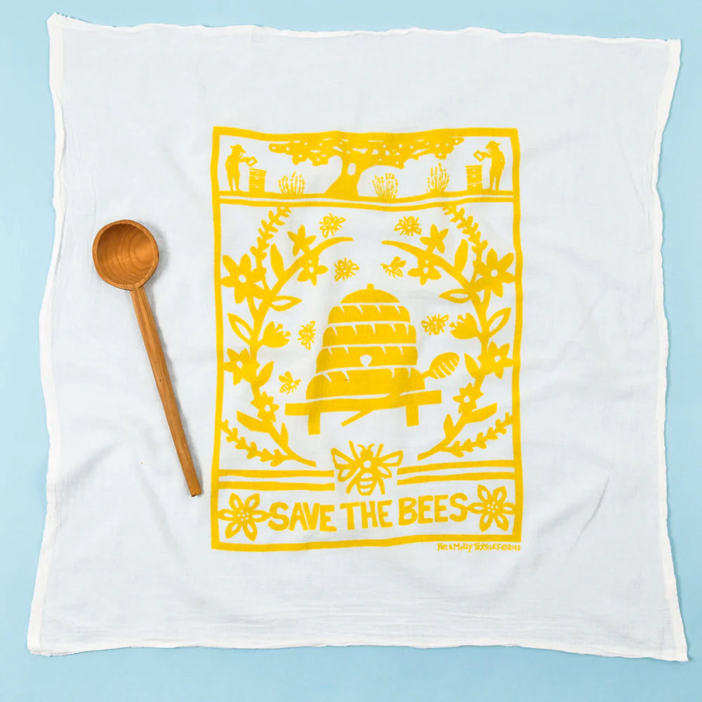 Kei & Molly Flour Sack Dish Towel in Bees, a white towel with a yellow beehive print reading Save the Bees