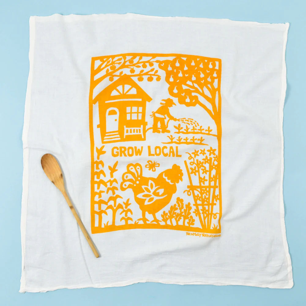 Kei & Molly Flour Sack Dish Towel in Grow Local Squash, a white towel with an orange garden and chicken print