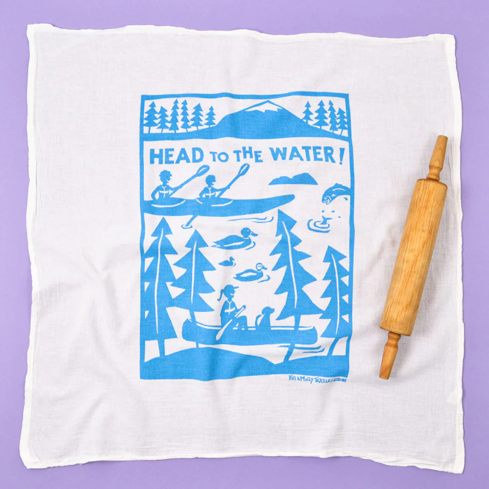 Kei & Molly Flour Sack Dish Towel in Head to the Water, a white towel with a blue canoe and lake print