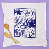 Kei & Molly Flour Sack Dish Towel in Octopus, a white towel with a navy blue octopus and sea life print