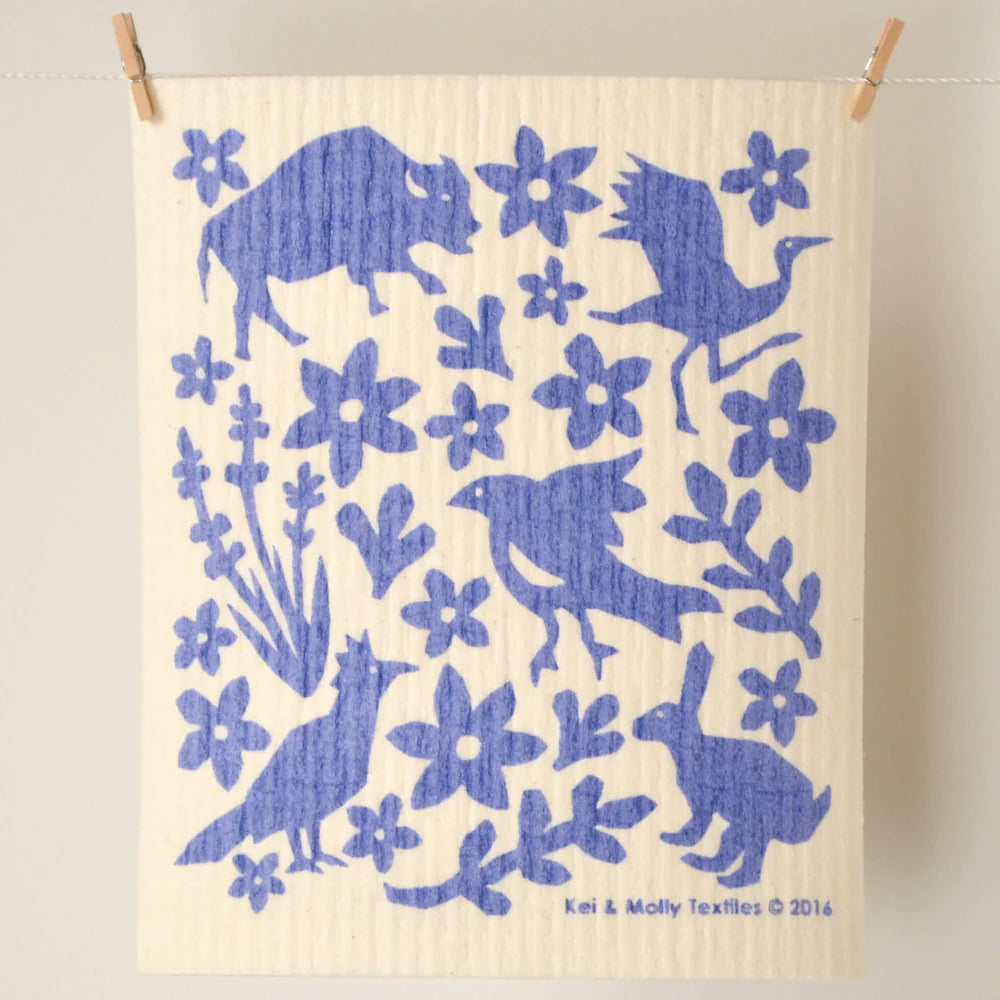 Kei & Molly Sponge Cloth in Buffalo, a cream cloth with a blue buffalo, bird and flower print