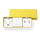 Kendra Scott Cailin Birthstone Gift Set for May in gold with Green Crystal, a pendant necklace and huggie earrings in a yellow gift box
