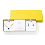 Kendra Scott Cailin Birthstone Gift Set for May in gold with Green Crystal, a pendant necklace and huggie earrings in a yellow gift box