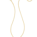 Kendra Scott Cailin Gold Birthday Pendant Necklace chain laid out on white
