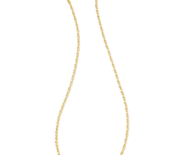 Kendra Scott Cailin Gold Birthday Pendant Necklace chain laid out on white
