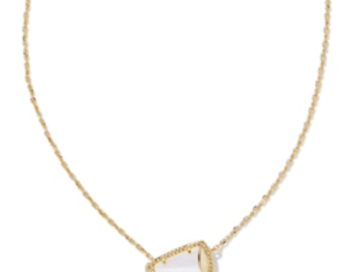Kendra Scott Cheer Short Pendant Necklace, a gold chain with a small white mother-of-pearl triangle pendant
